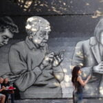 Mural of people on their phone, reduce screen time